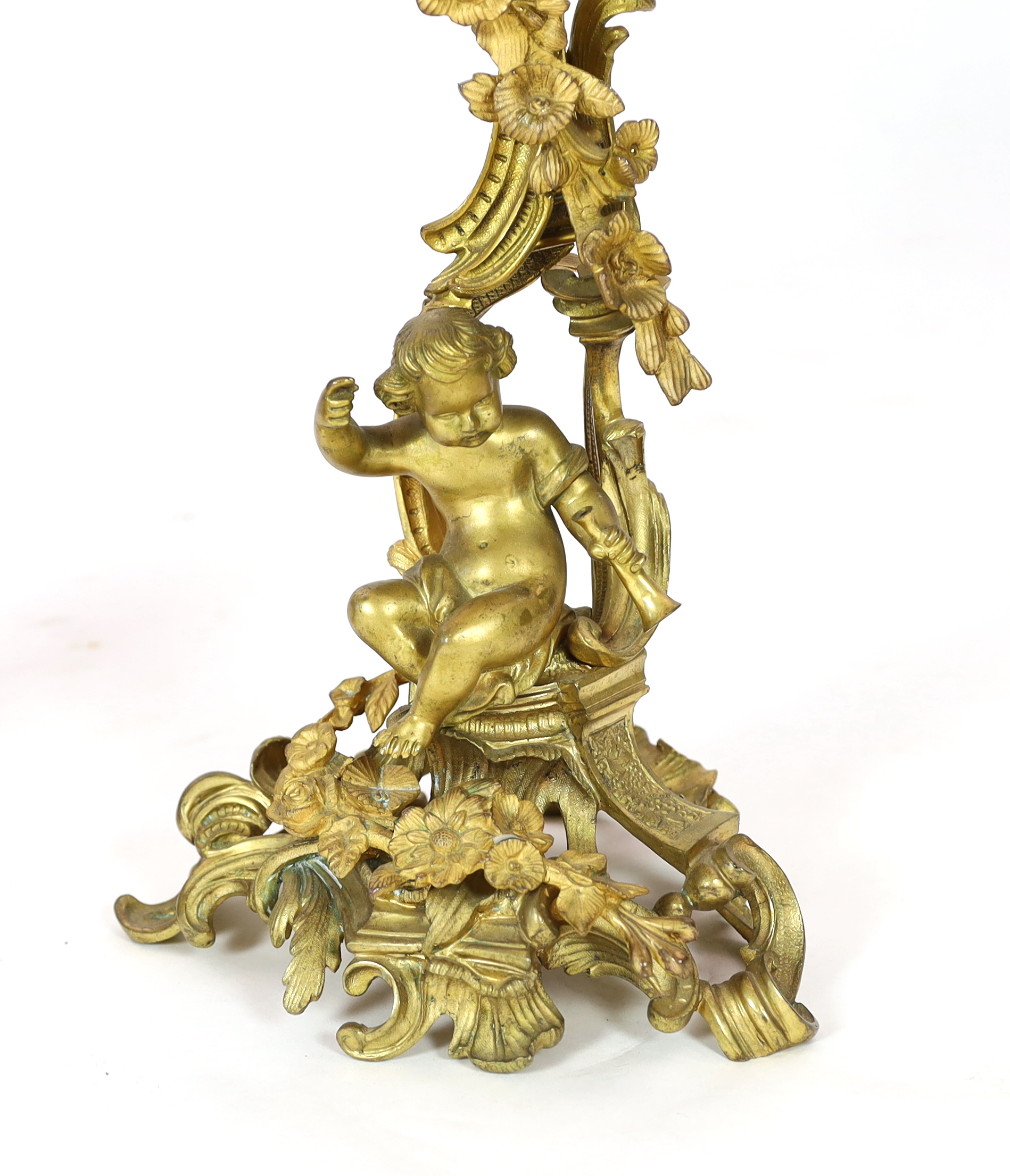 A pair of late 19th century French Louis XVI style ormolu seven light candelabra, 74cm high